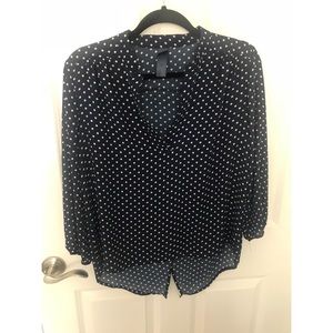 Blue and white polka dot blouse